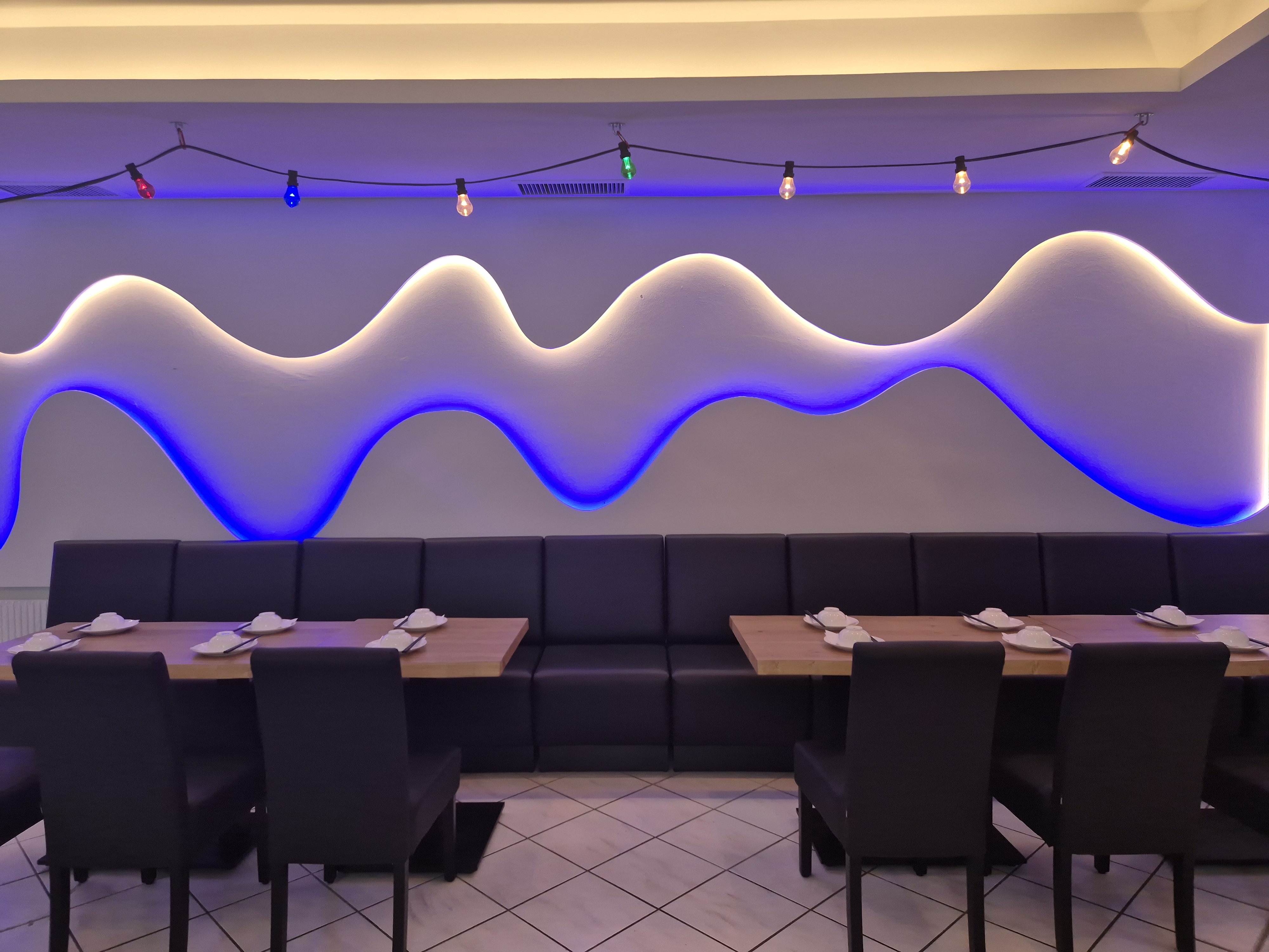 Modern lounge with neon wave accent
